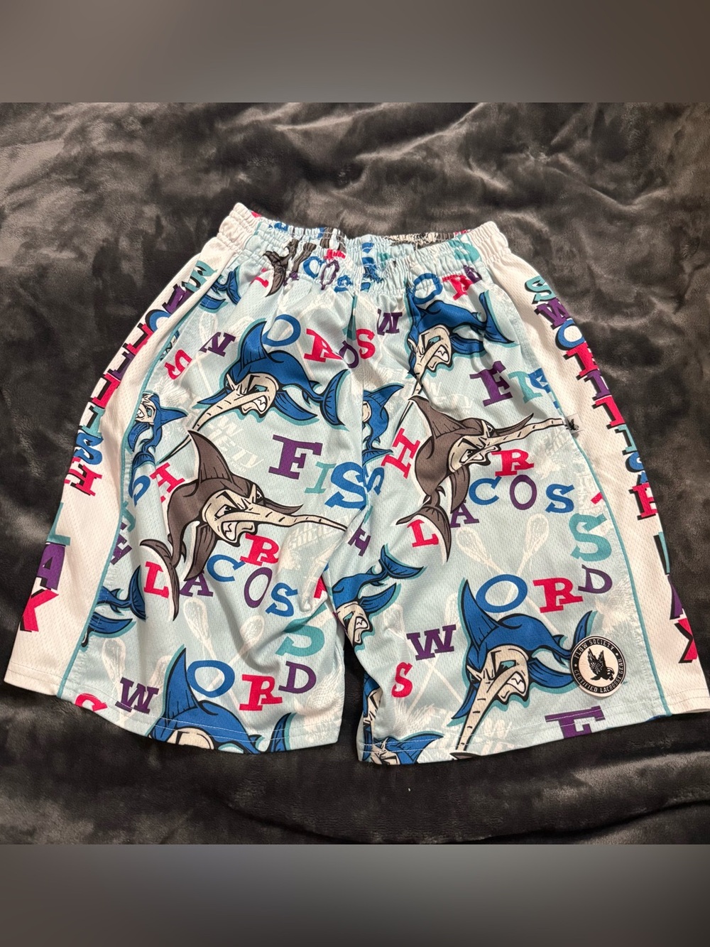 Boys Light Blue Marlin Print Athletic Shorts with Multicolor Letters